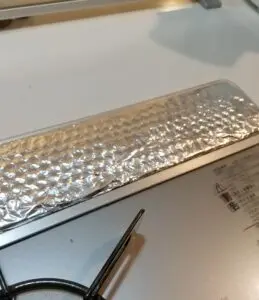 アルミホイルで排気口をガード